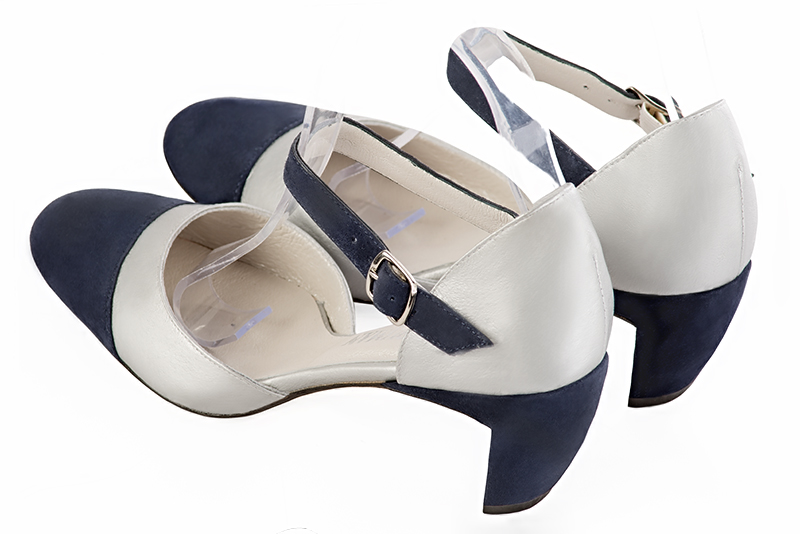 Navy blue and light silver women's open side shoes, with an instep strap. Round toe. Medium comma heels. Rear view - Florence KOOIJMAN